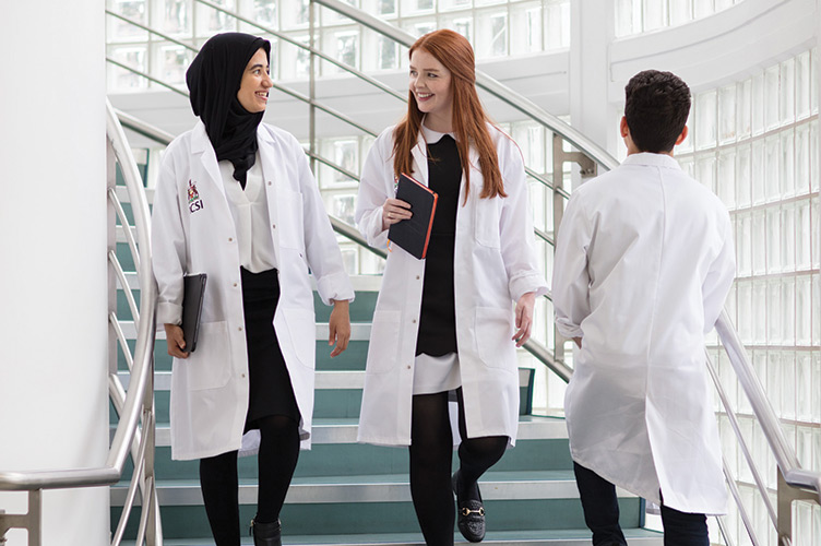 Students in white coats in Beaumont