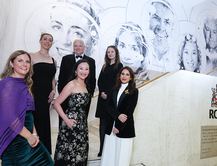 RCSI Alumni Award winners pictured in front of their portraits on the walls of 123 St Stephen's Green by artist Joe Caslin.