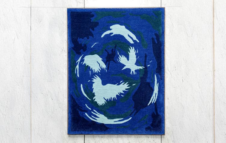 Tapestry artwork depicting visual patterns of neurological change hanging on a wall