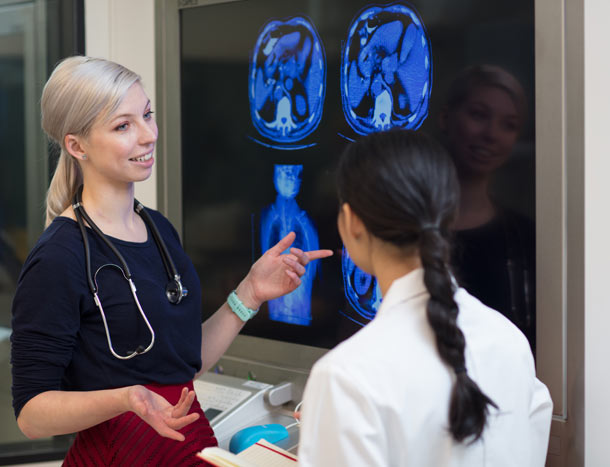 Tutor showing student scan