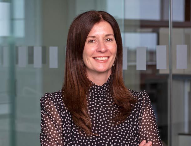 Headshot of Dr Triona Ni Chonghaile, featured in a quote about her career at RCSI.