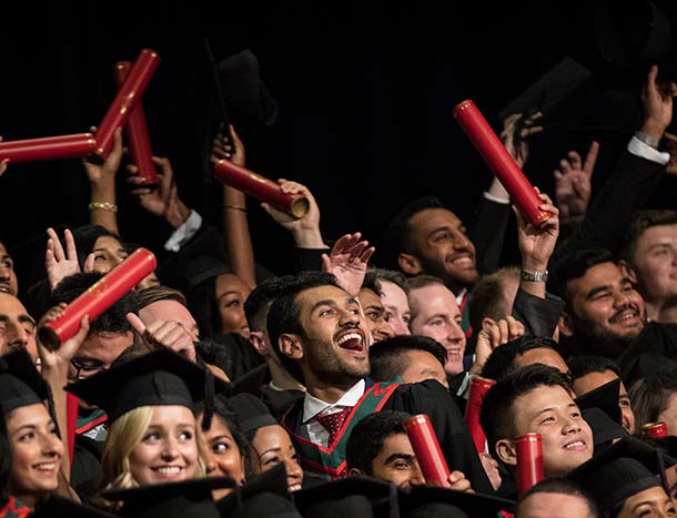 Large group of RCSI graduates in robes and caps