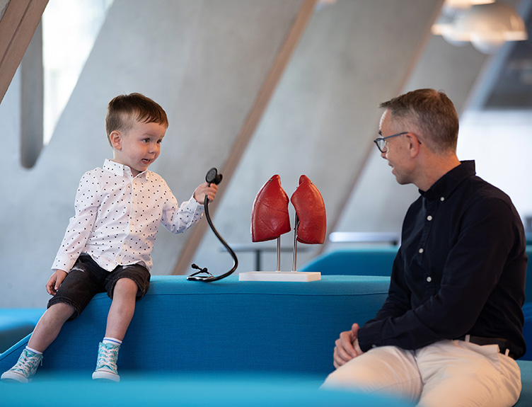 Isaac Byrne, (aged 2) who has cystic fibrosis, pictured with Paul McNally, Associate Professor of Paediatrics at RCSI and Consultant in Respiratory Medicine at Children’s Health Ireland.