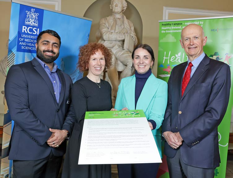RCSI signs Healthy Campus Charter A group pose with a large print out