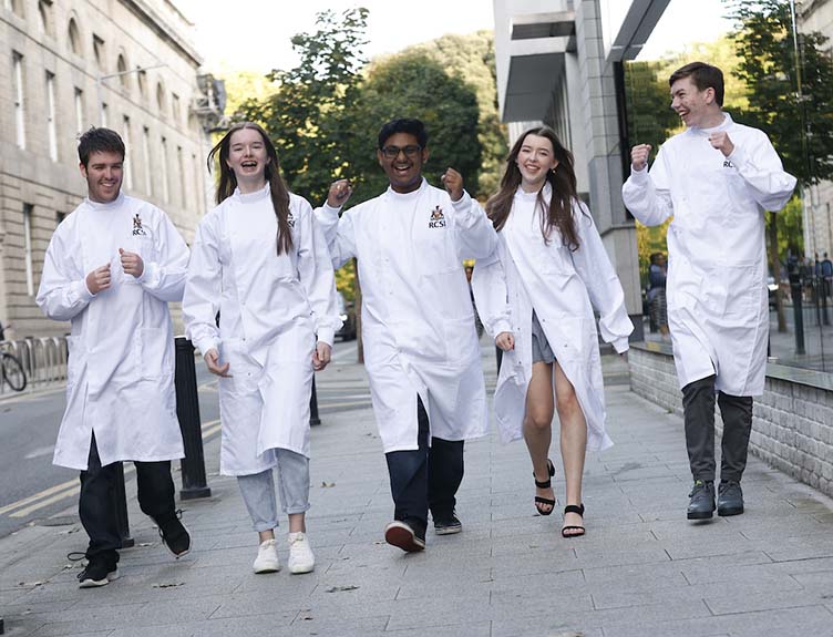 Students celebrate on York Street at the RCSI White Coat Ceremony, October 4 2023.
