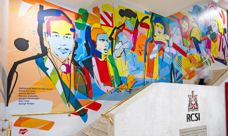 Large scale colourful artwork on university wall