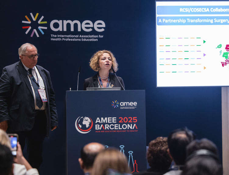 ASPIRE AMEE Speaker at awards ceremony speaks to an audience