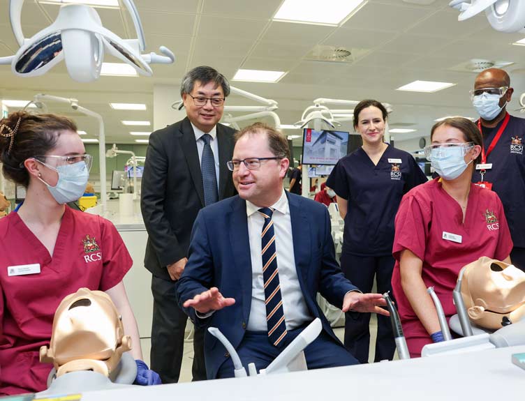 Clinical Skills Day Professor and Minister with RCSI Dentistry students during launch