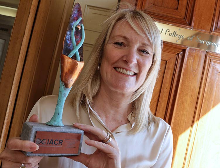 Prof Tracy Robson IACR award Award winner holds trophy