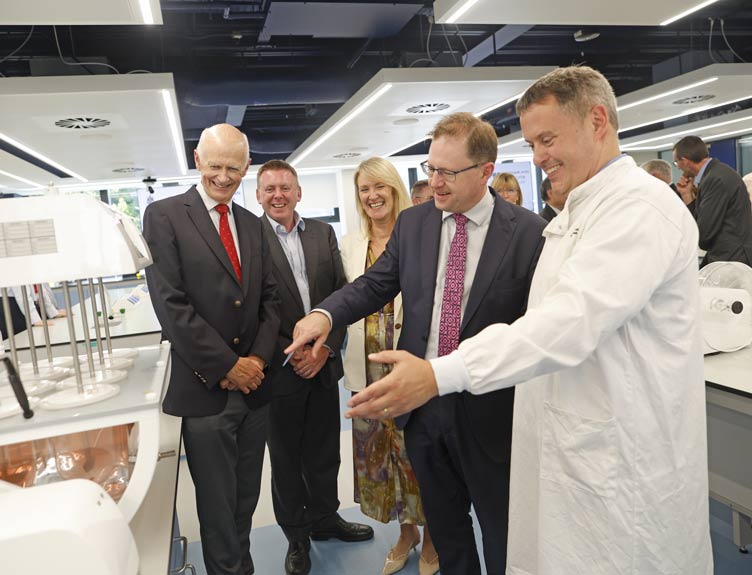 School of Pharmacy and Biomolecular Sciences teaching labs A group of people admire new equipment within a new pharmacy teaching lab