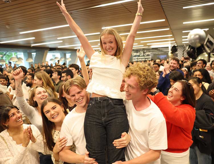 Student is held aloft and celebrated at the busy RCSI results reading 2026