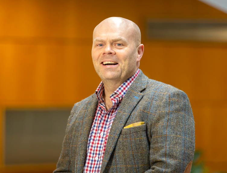Professor Mark White Mark White smiling headshot
