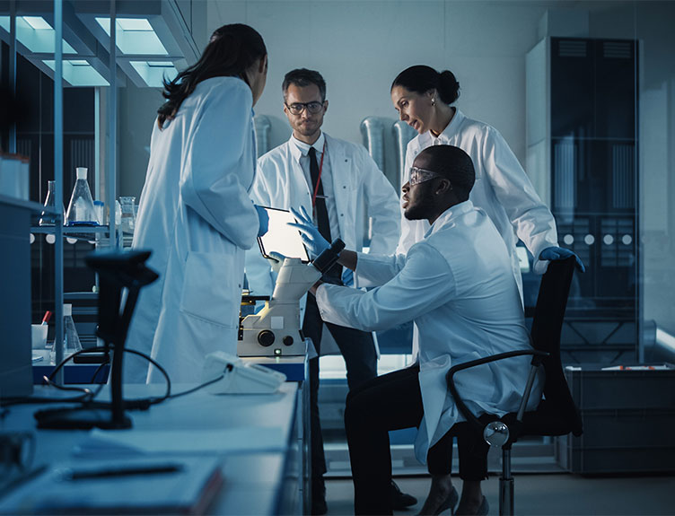 Four scientists in lab