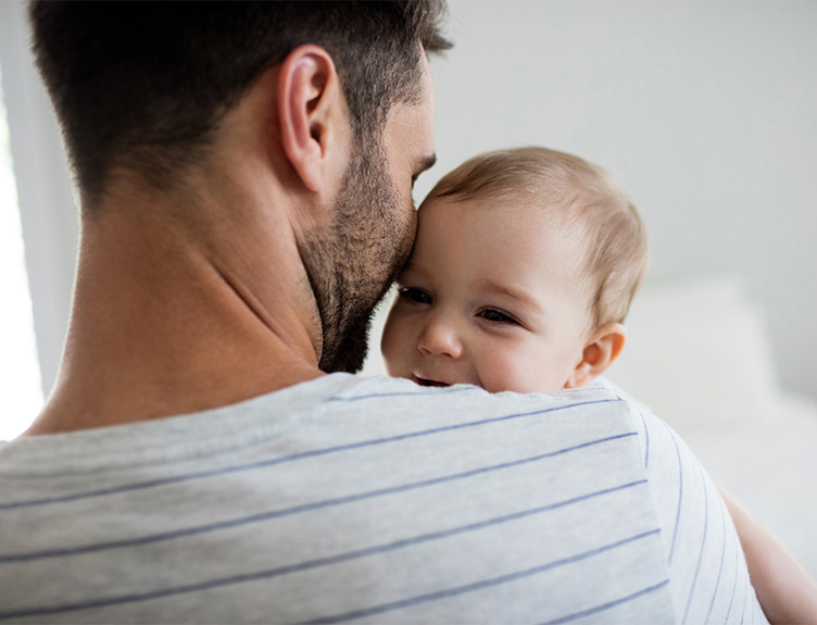 Father holding baby