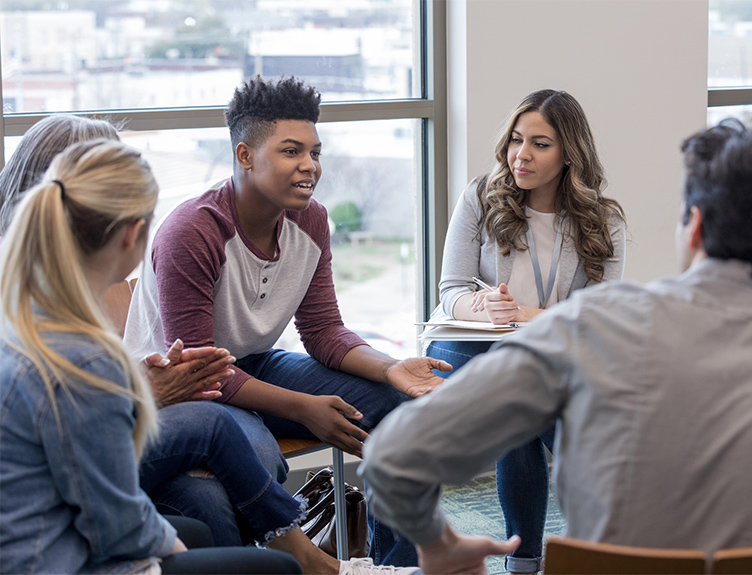 Teenagers in a group talking