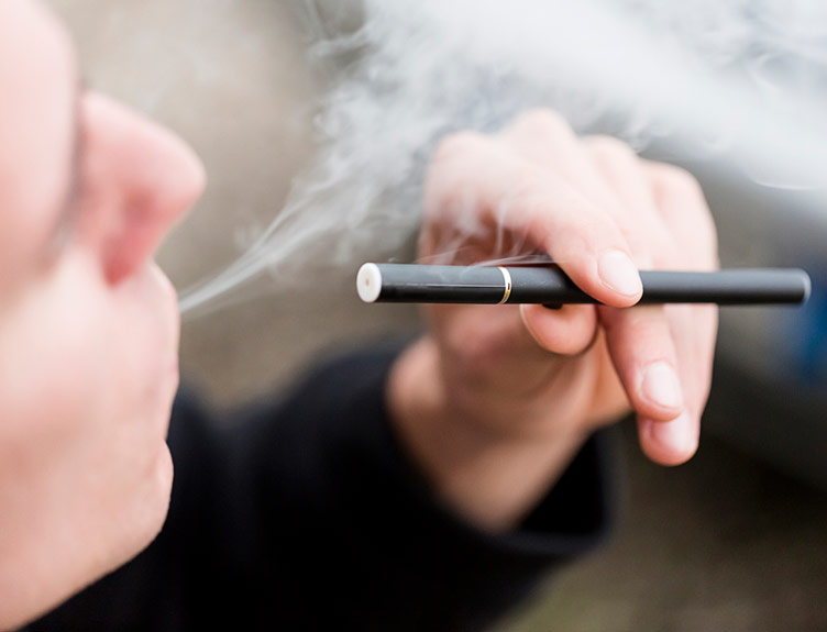 Close up of a person vaping