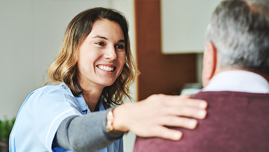 Healthcare worker with patient