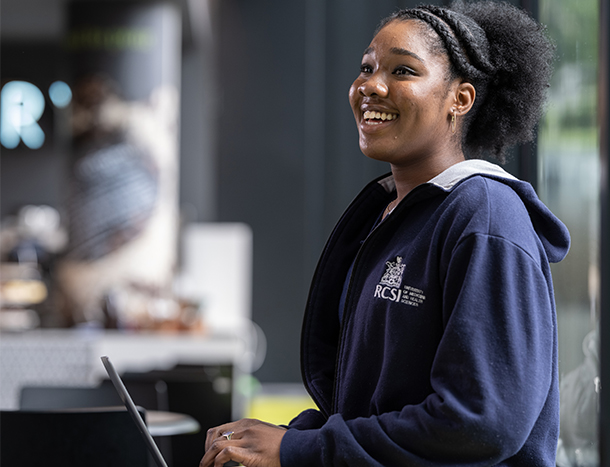 Student looking up from laptop