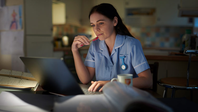 Nurse studying at night