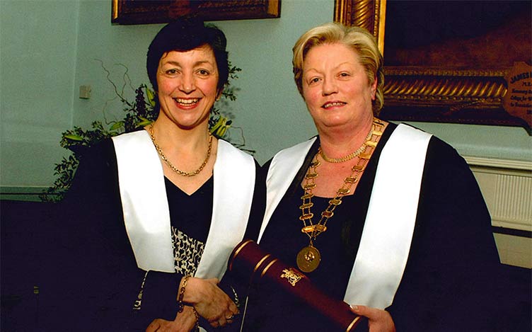 Anne Carrigy conferring