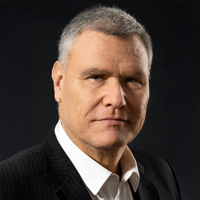 Head and shoulders headshot of Didier Jourdan