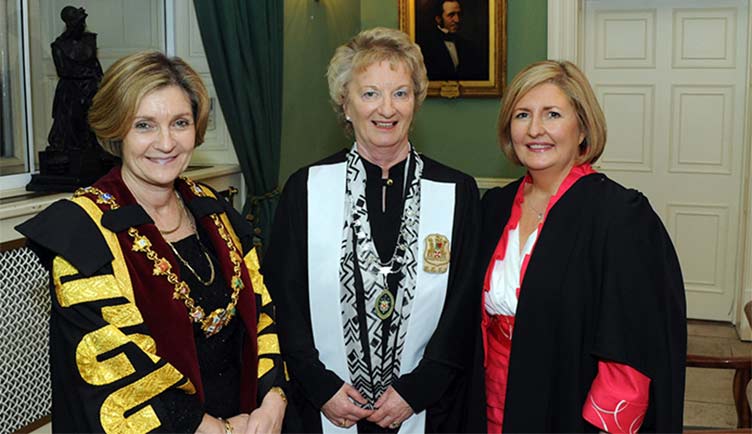 Elizabeth Adams conferring