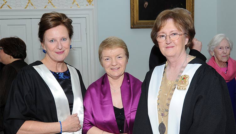 Mary Donohoe conferring