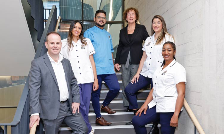 A team of medical professional pictured in a group shot