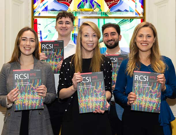 Students holding Student Medical Journal