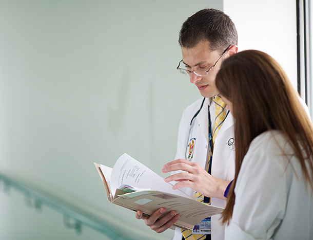 RCSI lecturer and student in hospital hallway
