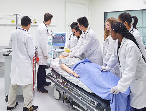 Undergrad students in simulation suite