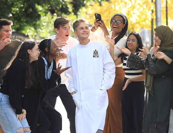 RCSI student gets photo with other students