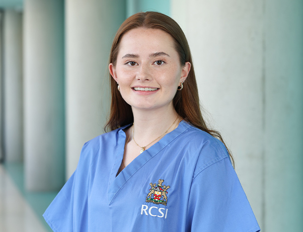Headshot of Iona Hourican in RCSI scrubs. 
