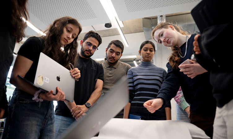 Group of students review report