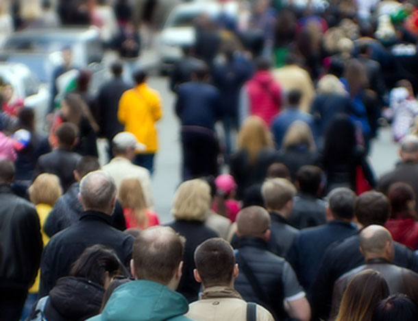 Pedestrians on a busy street.