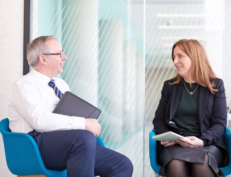 Two professionals navigating the academic journey