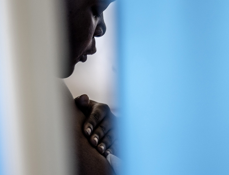 An artistic shot of a Malawian woman from Antonio Jaén Osuna's powerful Akazi Exhibition.