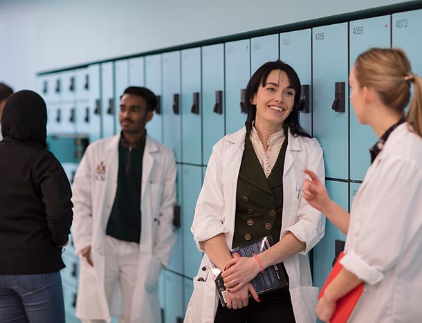 Students standing at lockers in 26 York Street
