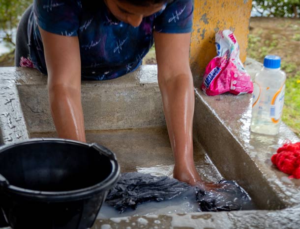 Person washing clothing in Guatemala