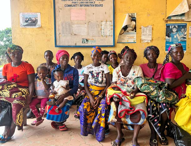 Large group of mothers with children in Sierra Leone