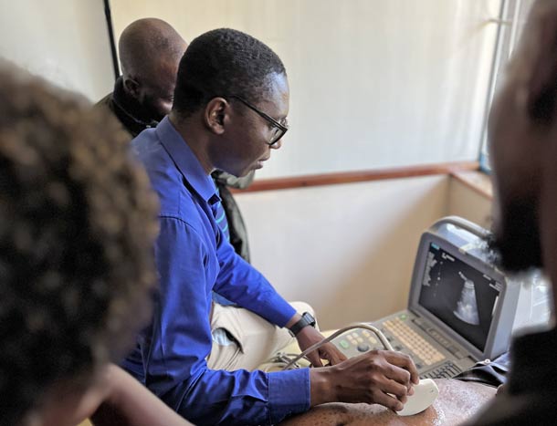 Medical professional examines ultrasound